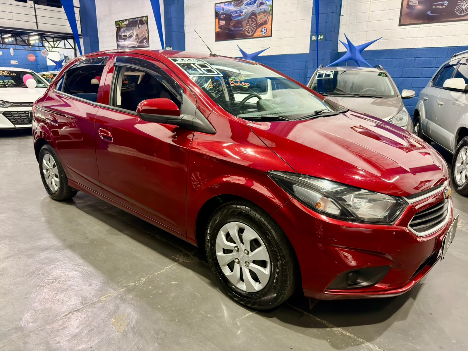 Chevrolet ONIX 2018 vermelho seminovo à venda na B.R.M Multimarcas em Bragança Paulista